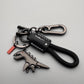 🦖🔑Lega di alluminio Dinosauro Charm accoppiato con un braccialetto tessuto a mano