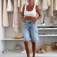 Pantaloni midi in denim retrò distrutti