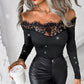 Top da donna con spalle scoperte, maniche lunghe e dettagli glitterati