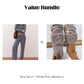 Completo da donna composto da top e pantaloni a righe in maglia, due pezzi.