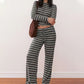 Completo da donna composto da top e pantaloni a righe in maglia, due pezzi.