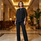 Elegante completo di pantaloni asimmetrici in due pezzi