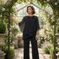 Elegante completo di pantaloni asimmetrici in due pezzi