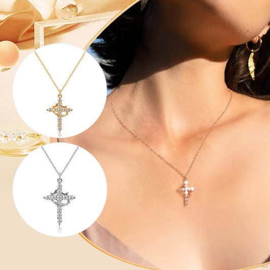 Squisita collana con croce e corona girevole.