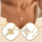 Squisita collana con croce e corona girevole.