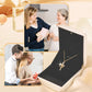 Squisita collana con croce e corona girevole.