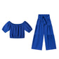 Set di due pezzi composto da top con spalle scoperte e maniche a sbuffo e pantaloni a gamba larga