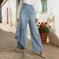 Gonna e pantaloni in denim asimmetrici a portafoglio