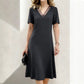 Abito elegante da donna con scollo a V e inserti in rete