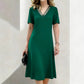 Abito elegante da donna con scollo a V e inserti in rete