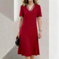 Abito elegante da donna con scollo a V e inserti in rete