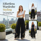 Eleganti pantaloni a gamba larga e fluidi con finiture dorate.