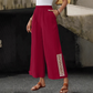 👖 SCONTO DEL 50% PER UN PERIODO LIMITATO! ✨ Pantaloni da donna a gamba larga – Vita elasticizzata, polsini con nappine, drappeggio, stile bohémien ✨