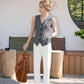 Elegante gilet da donna con scollo a V e bottoni sul davanti.