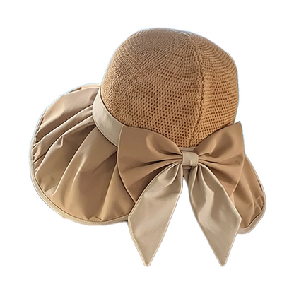 Cappello da sole a corona in maglia traspirante con fiocco.