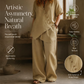Completo da Donna con Top Asimmetrico e Pantaloni a Gamba Larga