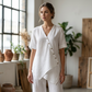 Completo da Donna con Top Asimmetrico e Pantaloni a Gamba Larga