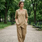 Completo da Donna con Top Asimmetrico e Pantaloni a Gamba Larga