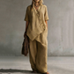 Completo da Donna con Top Asimmetrico e Pantaloni a Gamba Larga