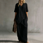 Completo da Donna con Top Asimmetrico e Pantaloni a Gamba Larga